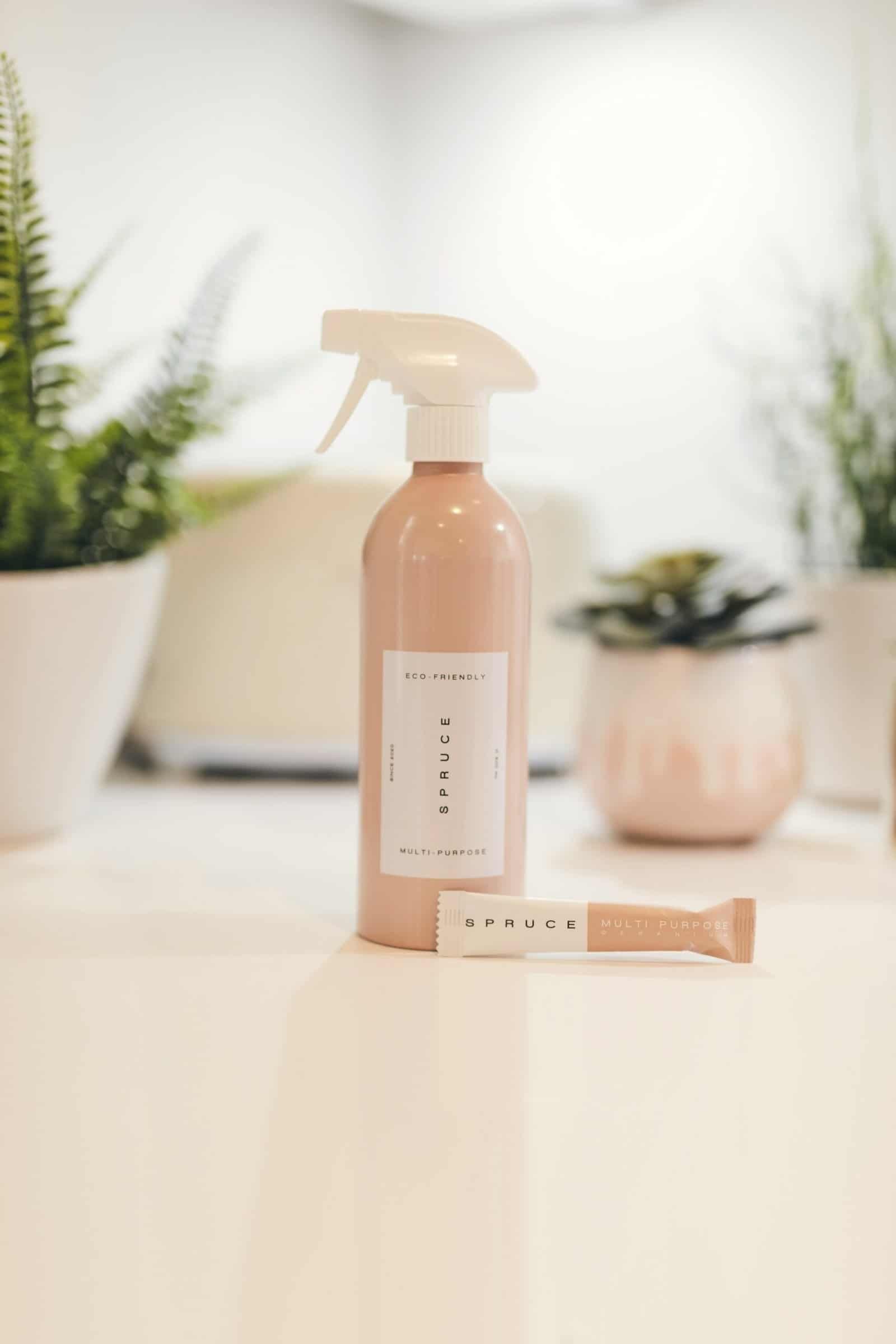 Zero waste cleaning supplies including reusable cloths and glass bottles